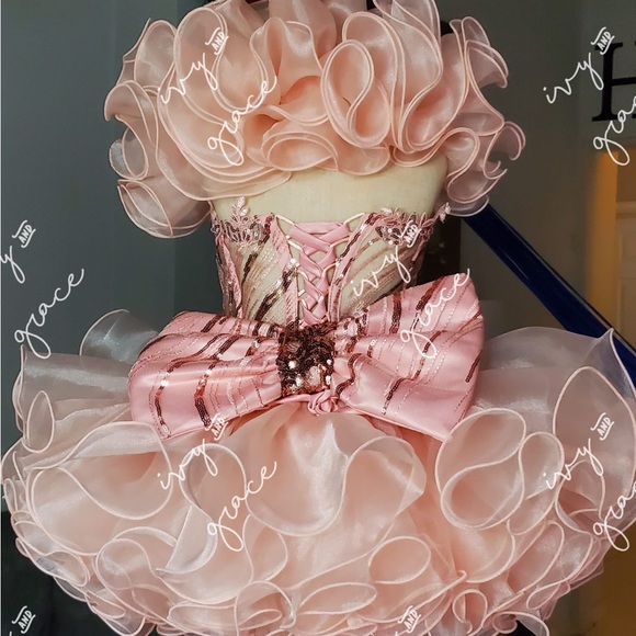 2/4 slim 5 Ivy & Grace pageant dress.
It’s so beautiful worn once maybe 20 mins. - Picture 3 of 3